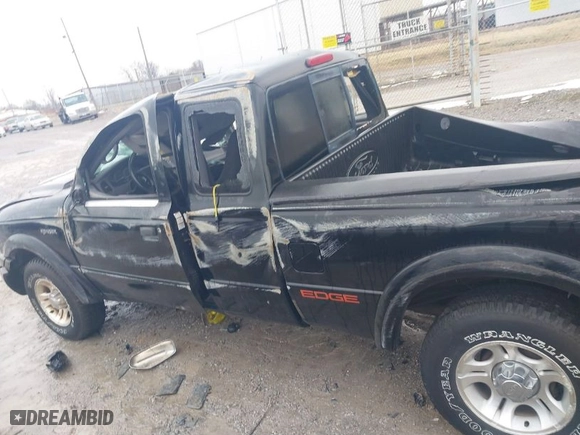 2003 Ford Ranger XL with VIN 1FTYR14U03PB87439, listed as a IAAI auction lot 41299680 with 216,310 mi miles. Bid and sale history available at carsss.com. Image 13.