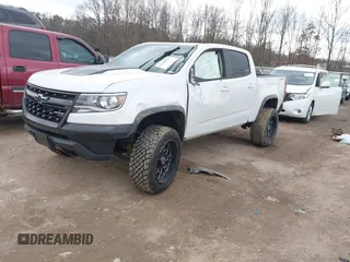 2018 Chevrolet Colorado 4WD ZR2 with VIN 1GCGTEEN3J1295176, listed as a IAAI auction lot 41418943 with 57,621 mi miles. Bid and sale history available at carsss.com. Image 2.