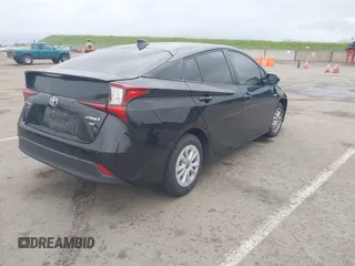 2022 Toyota Prius L Eco with VIN JTDKAMFU8N3188361, listed as a IAAI auction lot 41726369 with 48,517 mi miles and . Bid and sale history available at DreamBid. Image 4.