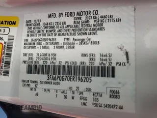 2014 Ford Fusion S with VIN 3FA6P0G70ER196205, listed as a IAAI auction lot 42165165 with 123,504 mi miles. Bid and sale history available at carsss.com. Image 1.