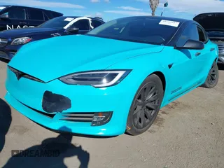2018 Tesla Model S 75D with VIN 5YJSA1E29JF263418, listed as a IAAI auction lot 41682037 with 84,764 mi miles and . Bid and sale history available at DreamBid. Image 22.