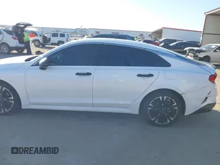 2022 Kia K5 GT-Line z VIN 5XXG64J23NG089623, wystawiony jako IAAI lot #41291422 z przebiegiem 128 273 mil mil oraz . Historia ofert i sprzedaży dostępna na DreamBid. Obrazek 14.