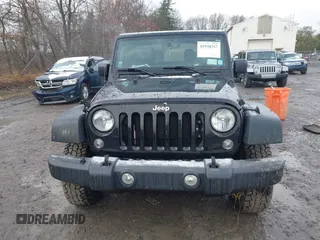 2017 Jeep Wrangler Sport z VIN 1C4GJWAG1HL502374, wystawiony jako IAAI lot #41938257 z przebiegiem 95 469 mil mil oraz . Historia ofert i sprzedaży dostępna na DreamBid. Obrazek 12.