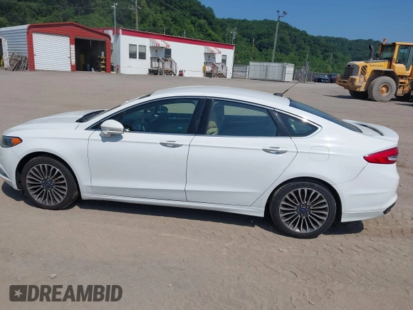 2017 Ford Fusion Titanium with VIN 3FA6P0K90HR168031, listed as a IAAI auction lot 42578926 with 210,268 mi miles and . Bid and sale history available at DreamBid. Image 14.