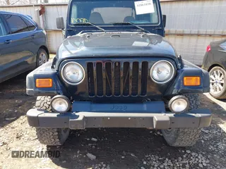 2000 Jeep Wrangler Sport with VIN 1J4FA49S8YP749547, listed as a IAAI auction lot 41861030 with 110,186 mi miles and . Bid and sale history available at DreamBid. Image 12.