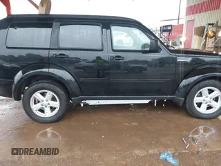 2007 Dodge Nitro SXT with VIN 1D8GT28K67W683600, listed as a IAAI auction lot 40958011 with 70,141 mi miles. Bid and sale history available at carsss.com. Image 13.