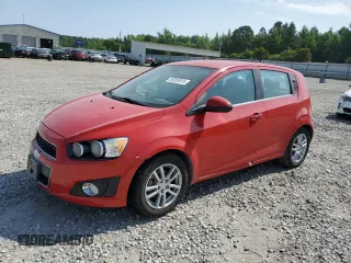 2012 Chevrolet Sonic LT with VIN 1G1JC6SH4C4210303, listed as a Copart auction lot 59353815 with 130,311 mi miles and Salvage title. Bid and sale history available at DreamBid. Image 1.