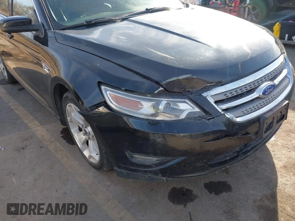 2012 Ford Taurus SEL z VIN 1FAHP2EW3CG128208, wystawiony jako IAAI lot #41020348 z przebiegiem 161 794 mil mil oraz . Historia ofert i sprzedaży dostępna na DreamBid. Obrazek 6.