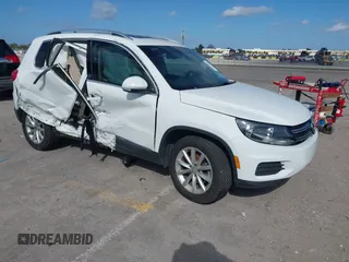 2017 Volkswagen Tiguan Wolfsburg Edition with VIN WVGRV7AX9HK003245, listed as a IAAI auction lot 41263712 with 90,455 mi miles and . Bid and sale history available at DreamBid. Image 1.