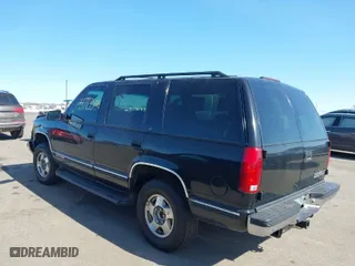 1999 Chevrolet Tahoe Z71 with VIN 1GNEK13R3XJ460393, listed as a IAAI auction lot 41773500 with 148,691 mi miles. Bid and sale history available at carsss.com. Image 3.