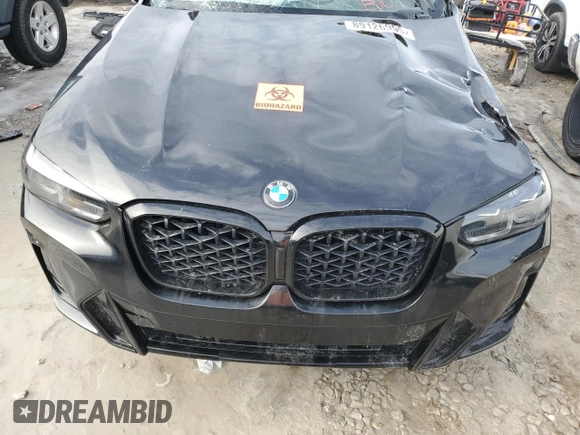 2024 BMW X4 xDrive30i z VIN 5UX33DT02R9U91458, wystawiony jako Copart lot #89126955 z przebiegiem Nie podano mil oraz Szkoda całkowita • Salvage title. Historia ofert i sprzedaży dostępna na DreamBid. Obrazek 13.