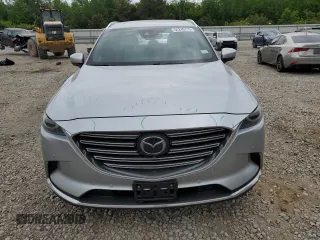 2021 Mazda CX-9 Carbon Edition с VIN JM3TCADY3M0517512, выставлен на аукционе Copart как лот 54240715 с пробегом 89 599 миль миль и Списание • Salvage title. История ставок и продаж доступна на DreamBid. Изображение 5.
