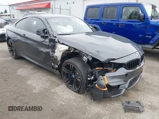 2015 BMW M4 with VIN WBS3R9C55FK333704, listed as a IAAI auction lot 40552025 with 1 mi miles. Bid and sale history available at carsss.com. Image 1.