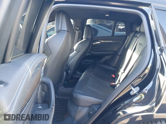 2020 BMW X4 M with VIN 5YMUJ0C05LLU67354, listed as a IAAI auction lot 41640960 with 38,948 mi miles. Bid and sale history available at carsss.com. Image 8.