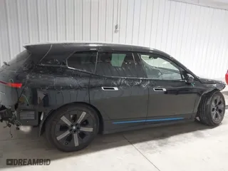 2023 BMW iX xDrive50 with VIN WB523CF04PCL15607, listed as a IAAI auction lot 41315457 with 44,058 mi miles. Bid and sale history available at carsss.com. Image 14.