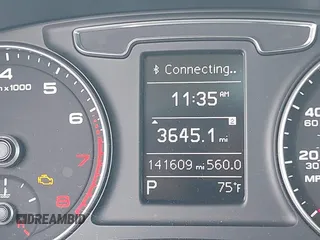 2016 Audi Q3 Premium Plus with VIN WA1BFCFSXGR022587, listed as a IAAI auction lot 42133288 with 141,609 mi miles. Bid and sale history available at carsss.com. Image 7.