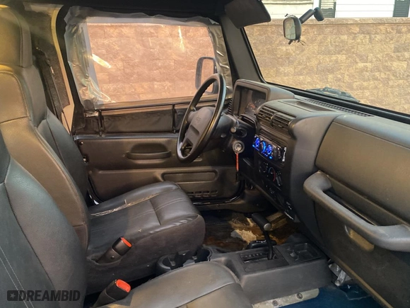 2003 Jeep Wrangler SE with VIN 1J4FA29143P371506, listed as a Copart auction lot 80153184 with 101,513 mi miles and Clean Title. Bid and sale history available at carsss.com. Image 5.