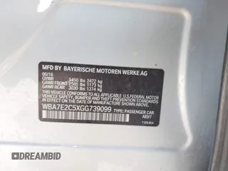 2016 BMW 7 Series 740i with VIN WBA7E2C5XGG739099, listed as a IAAI auction lot 41526038 with 123,900 mi miles. Bid and sale history available at carsss.com. Image 9.