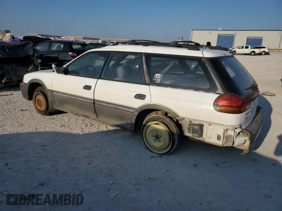 1996 Subaru Legacy Outback with VIN 4S3BG6857T7386841, listed as a Copart auction lot 70968724 with 122,232 mi miles and Salvage title. Bid and sale history available at DreamBid. Image 2.