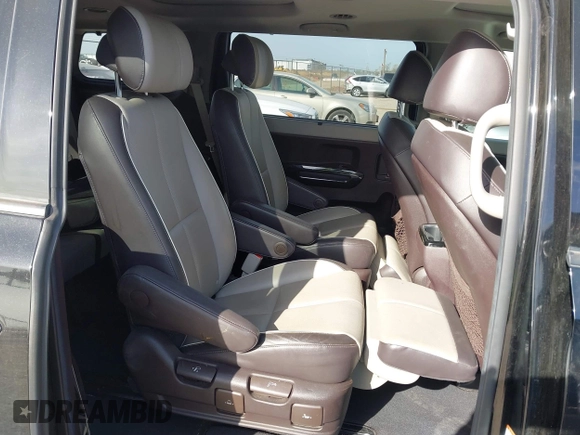 2015 Kia Sedona SX-L with VIN KNDME5C10F6033882, listed as a IAAI auction lot 41808805 with 81,936 mi miles and . Bid and sale history available at DreamBid. Image 8.