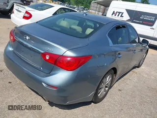 2014 Infiniti Q50 Premium with VIN JN1BV7AP3EM680901, listed as a IAAI auction lot 42143210 with 205,625 mi miles and . Bid and sale history available at carsss.com. Image 4.