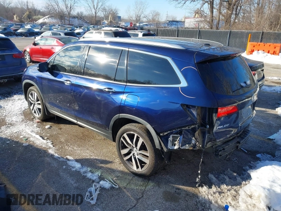 2017 Honda Pilot Touring with VIN 5FNYF6H99HB105446, listed as a IAAI auction lot 41283368 with 91,452 mi miles and . Bid and sale history available at DreamBid. Image 3.