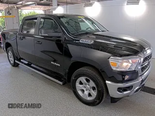 2023 Ram 1500 Big Horn with VIN 1C6RRFFG8PN574676, listed as a IAAI auction lot 42748127 with 65,296 mi miles and . Bid and sale history available at DreamBid. Image 1.