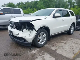 2012 Dodge Durango SXT with VIN 1C4RDJAG8CC336267, listed as a IAAI auction lot 42377138 with 179,555 mi miles and . Bid and sale history available at DreamBid. Image 18.