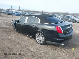 2012 Lincoln MKS with VIN 1LNHL9DR7CG800129, listed as a IAAI auction lot 41851280 with 144,992 mi miles. Bid and sale history available at carsss.com. Image 3.