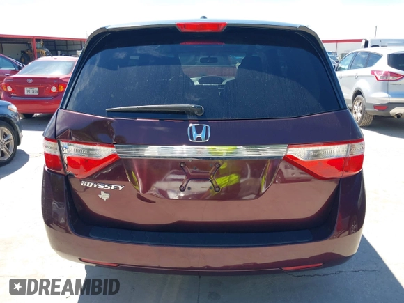 2011 Honda Odyssey EX-L with VIN 5FNRL5H60BB094647, listed as a IAAI auction lot 42223712 with 202,612 mi miles and . Bid and sale history available at carsss.com. Image 16.
