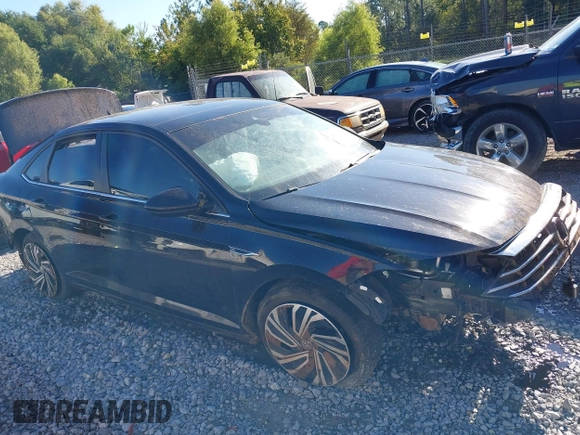 2020 Volkswagen Jetta SEL z VIN 3VWE57BU2LM093697, wystawiony jako IAAI lot #40437984 z przebiegiem 76 803 mil mil oraz . Historia ofert i sprzedaży dostępna na DreamBid. Obrazek 14.