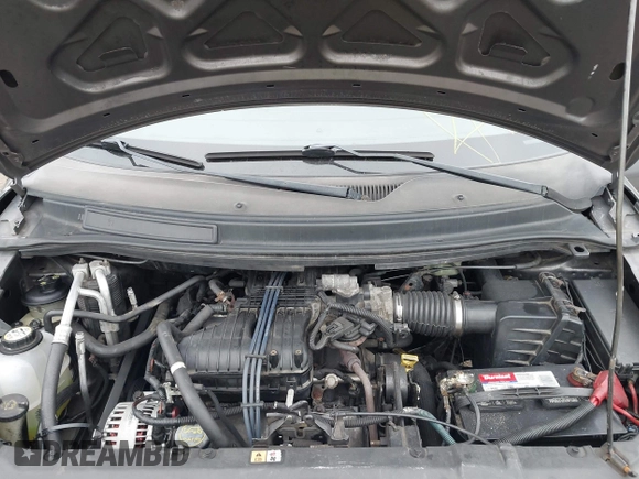 2005 Ford Freestar SE z VIN 2FMDA51645BA69323, wystawiony jako IAAI lot #40399931 z przebiegiem Nie podano mil oraz . Historia ofert i sprzedaży dostępna na DreamBid. Obrazek 10.