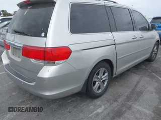 2008 Honda Odyssey Touring with VIN 5FNRL38908B058867, listed as a IAAI auction lot 42126471 with 201,088 mi miles and . Bid and sale history available at DreamBid. Image 4.