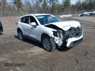 2016 Mazda CX-5 Sport with VIN JM3KE2BY9G0887110, listed as a IAAI auction lot 41761039 with 86,624 mi miles. Bid and sale history available at carsss.com. Image 1.
