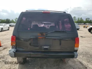 2000 Jeep Cherokee with VIN 1J4FT48S3YL139915, listed as a Copart auction lot 69840924 with 249,720 mi miles and Salvage title. Bid and sale history available at DreamBid. Image 6.