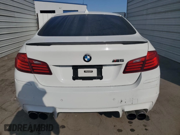 2014 BMW M5 with VIN WBSFV9C54ED097462, listed as a Copart auction lot 70482504 with 76,501 mi miles and Clean Title. Bid and sale history available at carsss.com. Image 6.