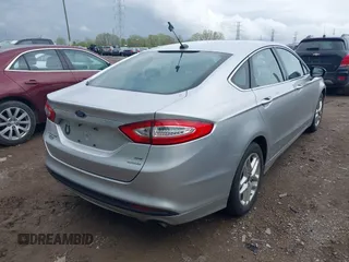 2014 Ford Fusion SE with VIN 3FA6P0HD9ER142812, listed as a IAAI auction lot 42135900 with 174,402 mi miles. Bid and sale history available at carsss.com. Image 4.