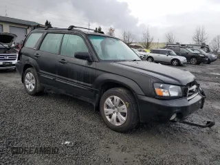 2003 Subaru Forester XS with VIN JF1SG65683H705256, listed as a Copart auction lot 87489904 with 293,143 mi miles and Salvage Title. Bid and sale history available at carsss.com. Image 4.