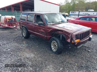 2000 Jeep Cherokee z VIN 1J4FF48S2YL166255, wystawiony jako IAAI lot #42151776 z przebiegiem 236 834 mil mil oraz . Historia ofert i sprzedaży dostępna na DreamBid. Obrazek 1.