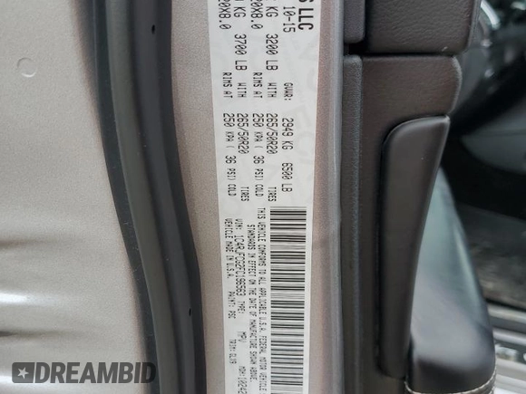 2015 Jeep Grand Cherokee High Altitude with VIN 1C4RJFCG2FC196563, listed as a Copart auction lot 56302315 with 143,759 mi miles and Salvage title. Bid and sale history available at DreamBid. Image 14.