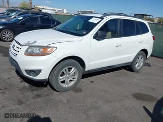 2010 Hyundai Santa Fe GLS with VIN 5NMSG3AB6AH339417, listed as a IAAI auction lot 42022856 with 166,850 mi miles. Bid and sale history available at carsss.com. Image 2.