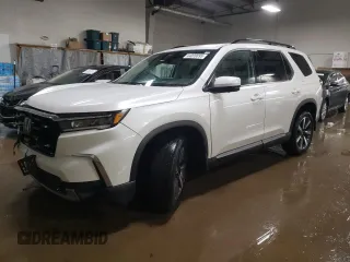 2023 Honda Pilot Elite with VIN 5FNYG1H89PB005675, listed as a Copart auction lot 44009895 with 35,514 mi miles and Salvage Title. Bid and sale history available at carsss.com. Image 1.