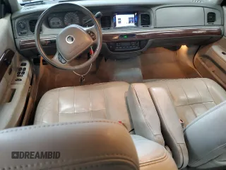 2003 Mercury Grand Marquis LS Premium z VIN 2MEHM75W33X645484, wystawiony jako Copart lot #58664585 z przebiegiem 145 064 mil mil oraz Tytuł czysty. Historia ofert i sprzedaży dostępna na DreamBid. Obrazek 8.