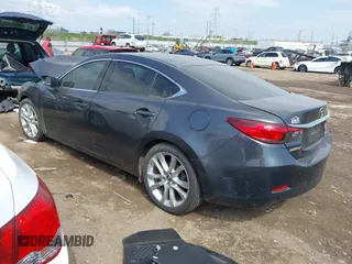 2016 Mazda 6 i Touring with VIN JM1GJ1V51G1433644, listed as a IAAI auction lot 42066262 with 95,546 mi miles and . Bid and sale history available at carsss.com. Image 3.
