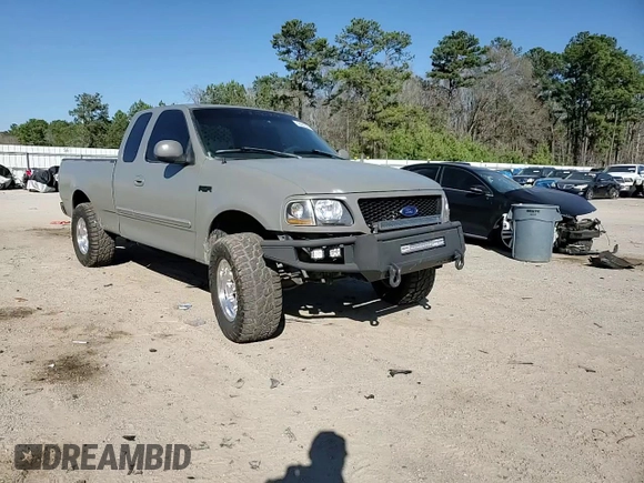 1999 Ford F-150 with VIN 1FTRX17W1XNC25527, listed as a Copart auction lot 48662525 with 150,544 mi miles and Salvage Title. Bid and sale history available at DreamBid. Image 10.