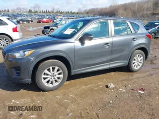 2016 Mazda CX-5 Sport with VIN JM3KE4BY5G0829927, listed as a IAAI auction lot 41678552 with 121,476 mi miles. Bid and sale history available at carsss.com. Image 21.