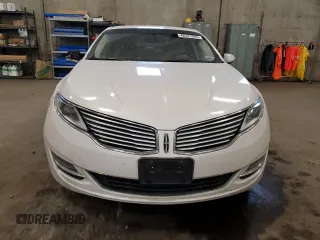2015 Lincoln MKZ z VIN 3LN6L2G96FR606196, wystawiony jako Copart lot #48531905 z przebiegiem 213 172 mil mil oraz Szkoda całkowita • Salvage title. Historia ofert i sprzedaży dostępna na DreamBid. Obrazek 5.