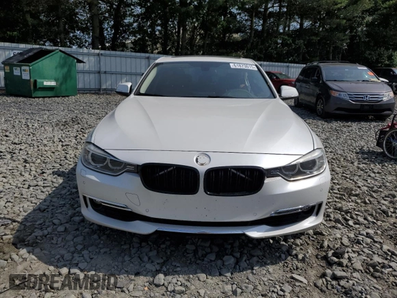 2015 BMW 3 Series 328i xDrive with VIN WBA3B3G52FNT19323, listed as a Copart auction lot 61873015 with 110,893 mi miles and Salvage title. Bid and sale history available at DreamBid. Image 5.