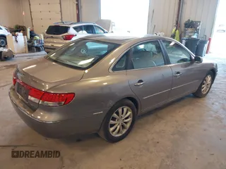 2007 Hyundai Azera SE z VIN KMHFC46F87A173110, wystawiony jako IAAI lot #42275974 z przebiegiem 208 901 mil mil oraz . Historia ofert i sprzedaży dostępna na DreamBid. Obrazek 4.