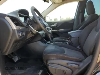 2016 Jeep Cherokee Altitude with VIN 1C4PJLAB2GW126428, listed as a Copart auction lot 56149585 with 214,359 mi miles and Salvage Title. Bid and sale history available at DreamBid. Image 7.